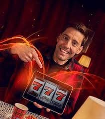 Mobile device displaying sports scores and casino games for Bangladesh users